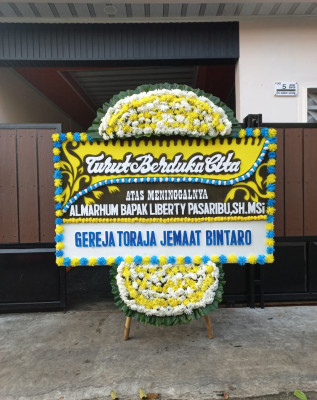 Papan Bunga Duka di Iwaka